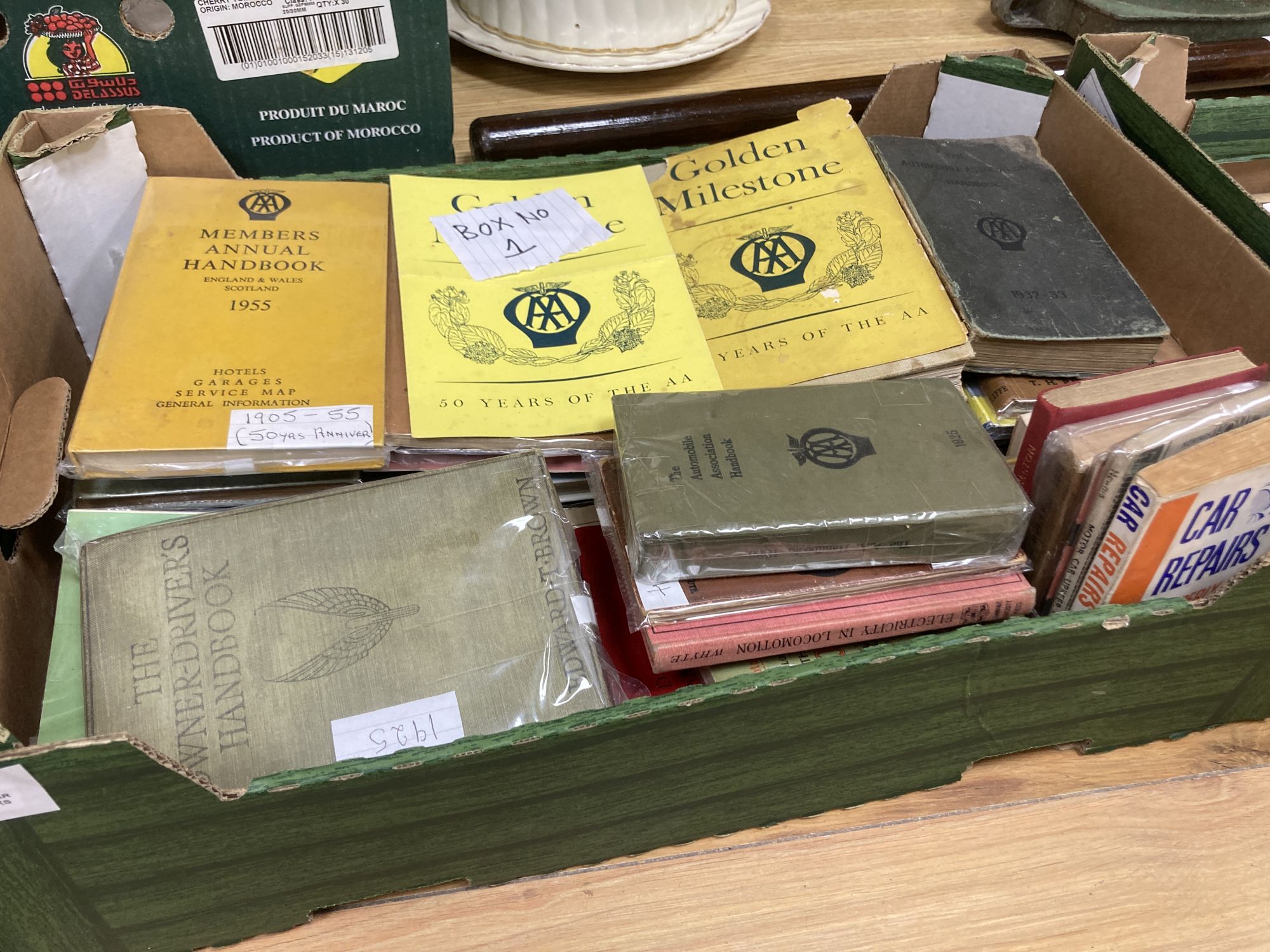 A box of car hand books